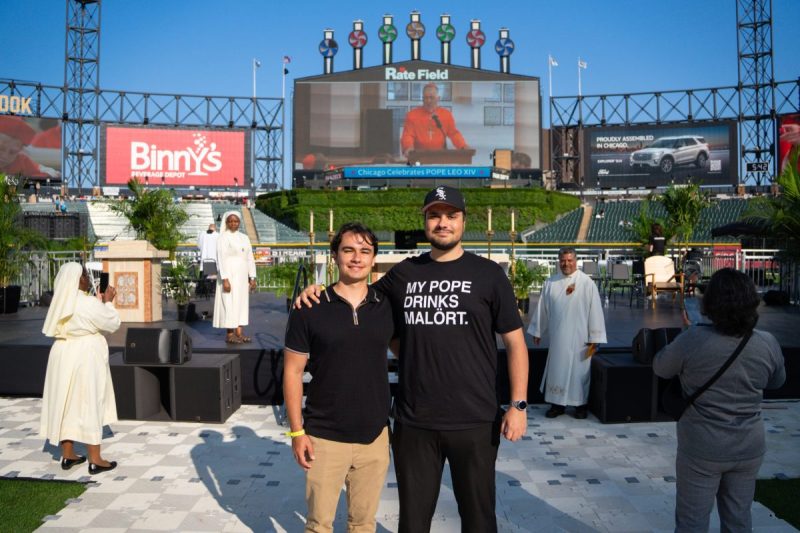 Jeff and Joey in front of the altar
